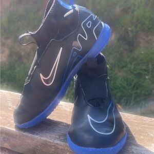 Nike Black and Blue Sneakers with Sporty Design